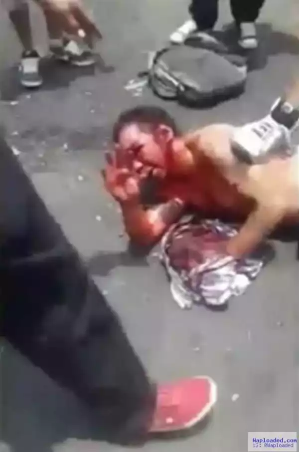 Guy brutally beaten after passengers catch him molesting sleeping woman (photos)